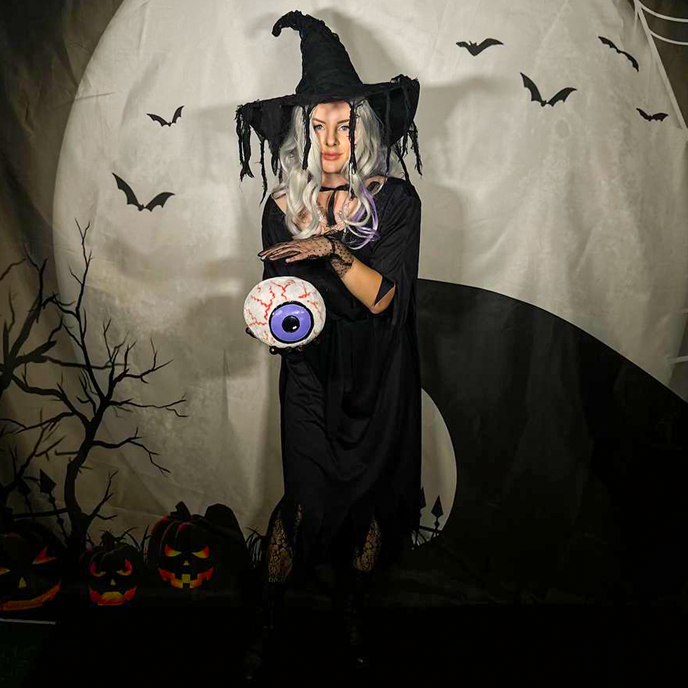 Witch Sabrina is a friendly sorceress who hosts spooky-cute games, potion fun, and photo moments, keeping kids engaged from start to finish.