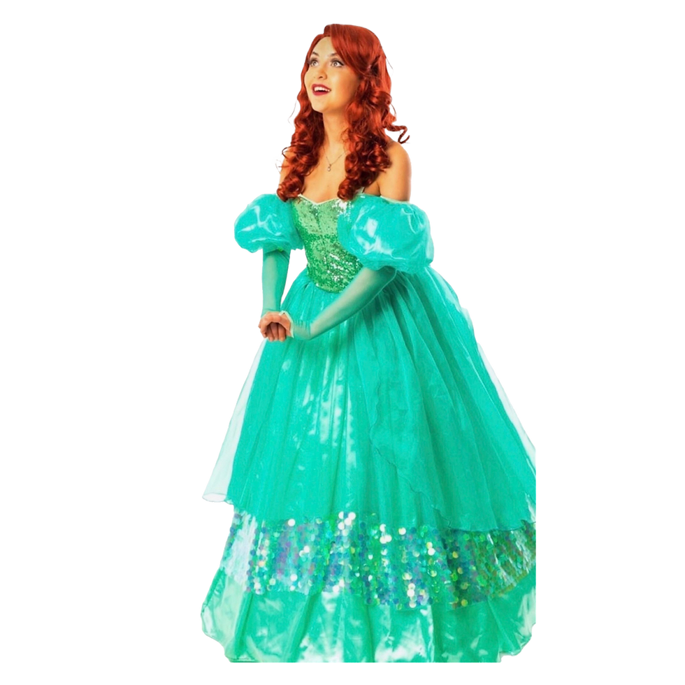 Ariel is in a vivid green ball gown with puff sleeves, shimmering bodice, and a sequined skirt inspired by ocean magic.