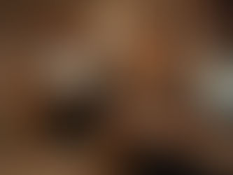 A wide shot of a hospital back office, heavily decorated with over-the-top Thanksgiving decorations across multiple desks and cubicles.