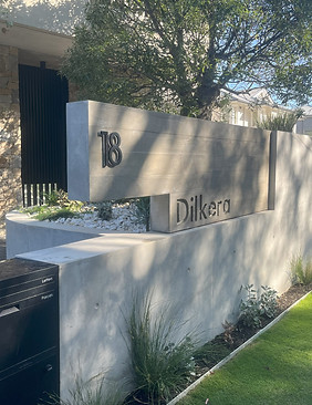 Off form concrete front garden wall