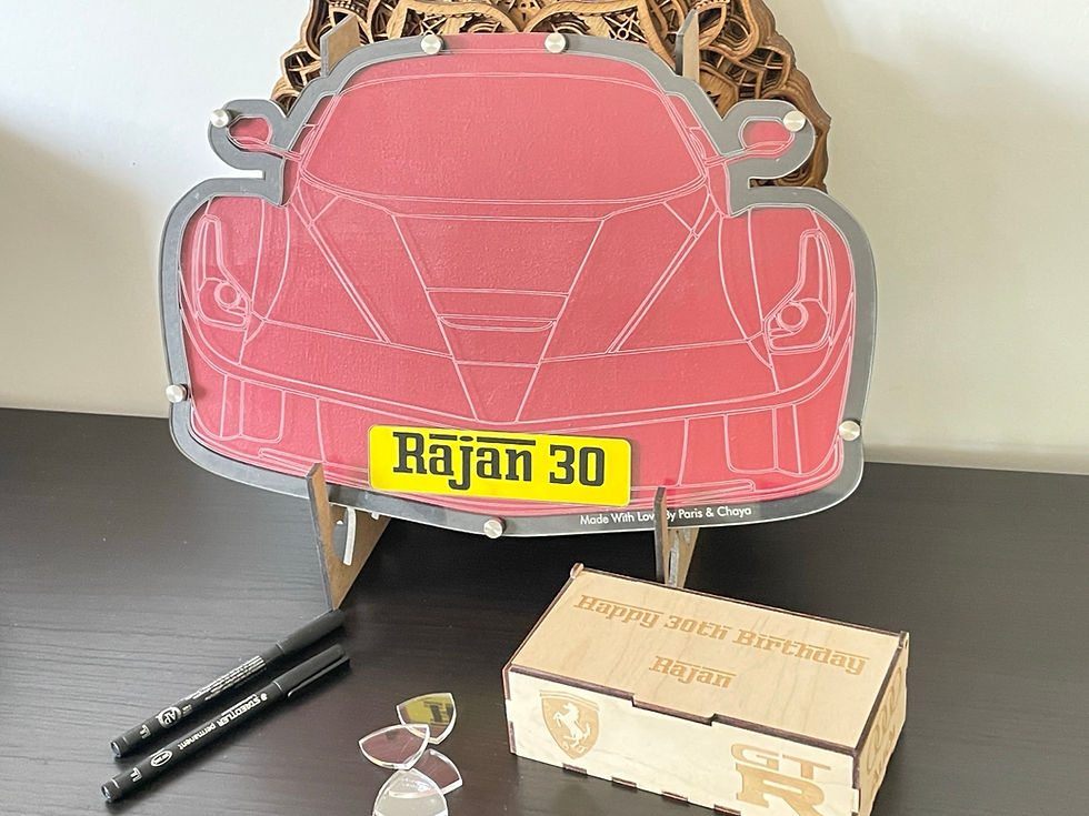 Full display set with red car-style board, wooden box, clear guest pieces, stand legs and pen props.