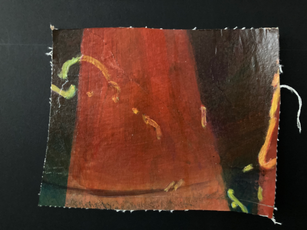 Portion og
f an abstract painting with brown, yellow,  and black colors