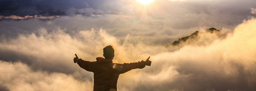 5505-free-happy-man-sunrise-clouds-unsplash-nghia-.jpg