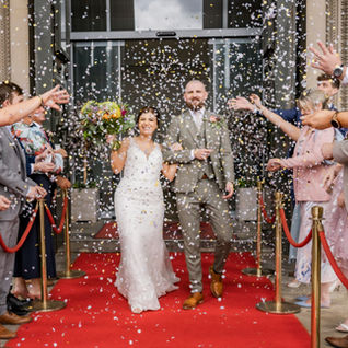newly married couple embracing in golden hour light, Shropshire wedding photographer
