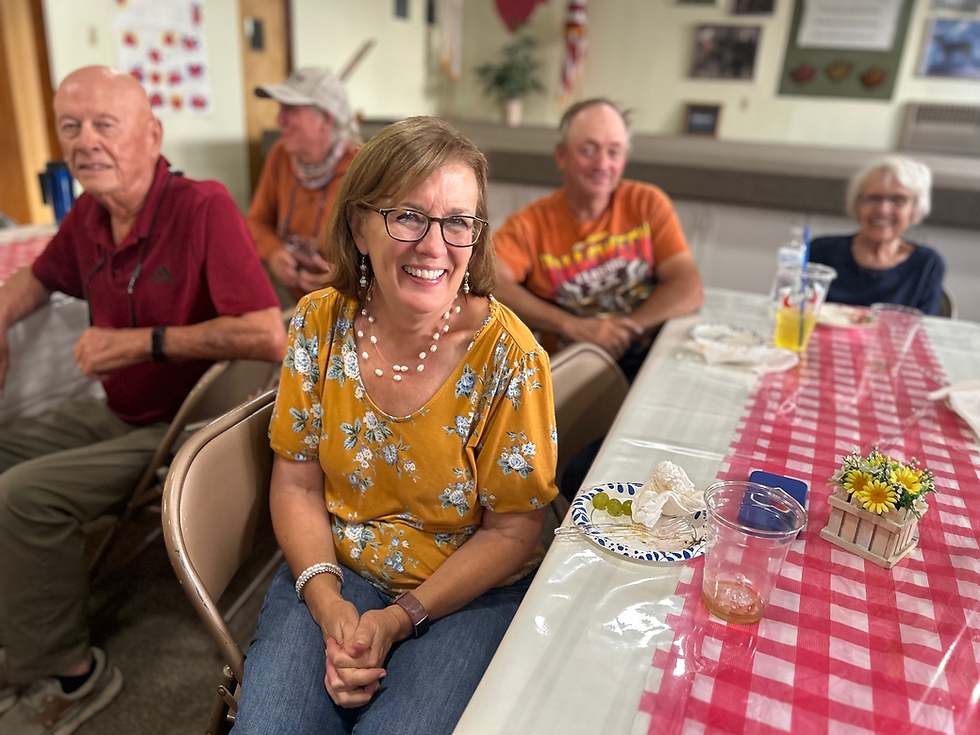 Kelly Clem in the foreground. Left to right behind her: Jack, Bob, Leon and Shirley.