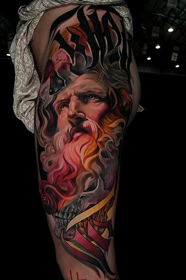 Old man split tattoo by Geri at Tattoolicious Waikiki.jpeg