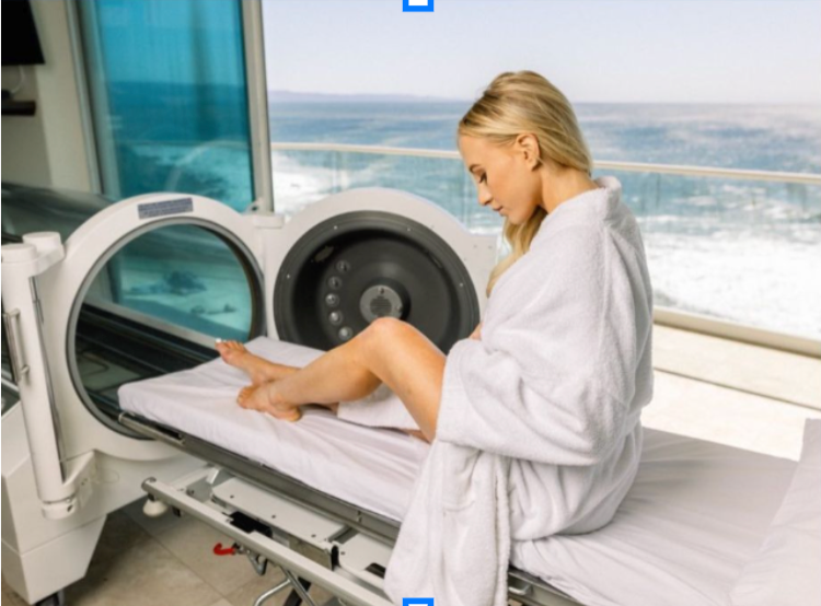 A girl experiencing a hyperbaric chamber session at Tulum oceanfront healing center