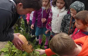 Mrs Lisa showing butternut squash - Forest School.webp