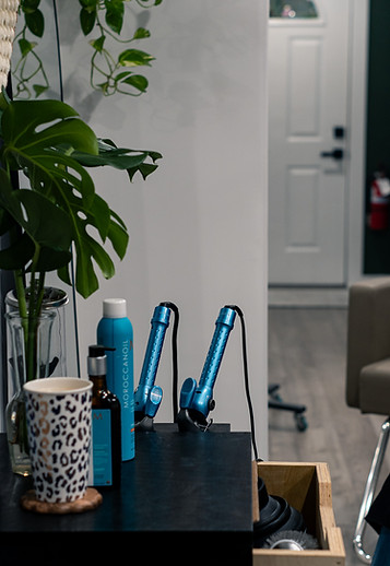 moroccanoil products and plants in salon asteria in slidell