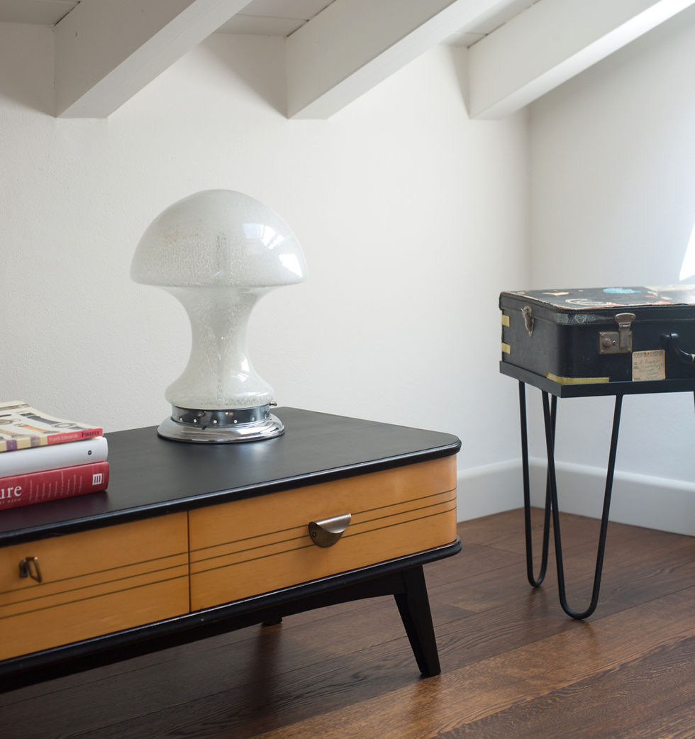 Low furniture chosen for an attic apartment