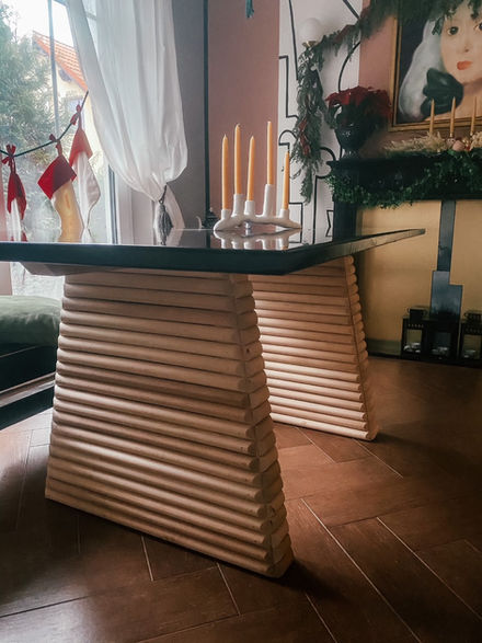 Horizontally fluted table with vintage marble top