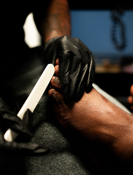 A customer getting a pedicure for men in Charlotte NC