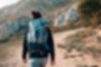 rear-view-male-hiker-with-backpack-hiking-mountains.jpg