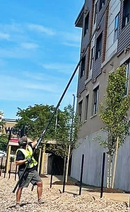 me cleaning 5 stories with water fed pol