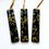 Thumbnail: Handmade black and gold holly fused glass hangings