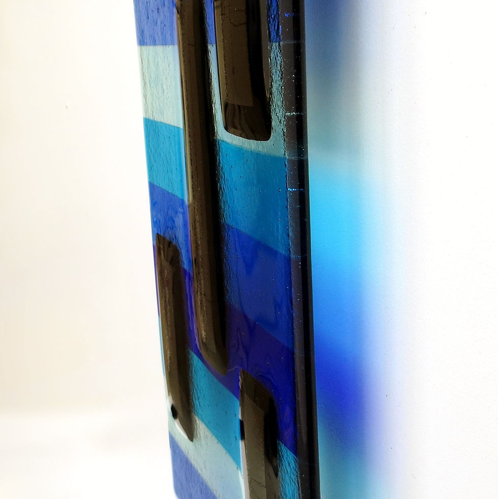 Thumbnail: Blue and silver striped fused glass wall art