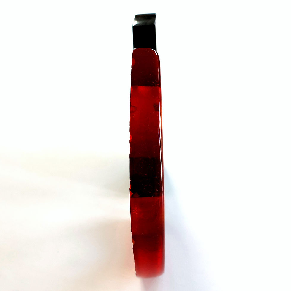 Thumbnail: Handmade black and orange cast glass sculpture