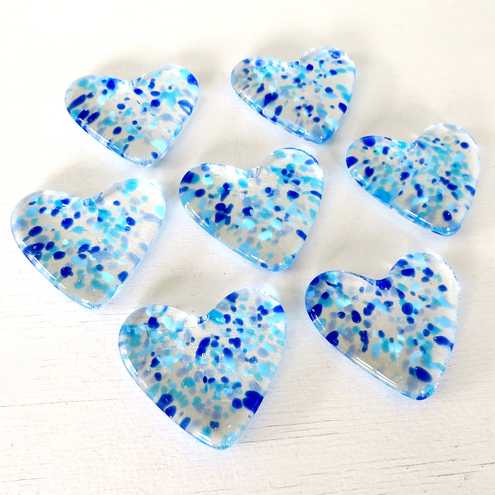 Thumbnail: Blue speckled fused glass pocket heart hugs