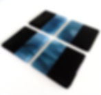 Set of four black and blue patterned fused glass coasters, RD Glass