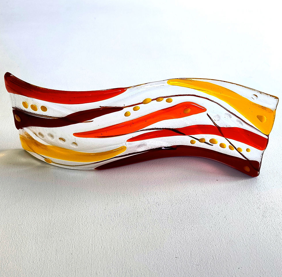 Thumbnail: Red and orange abstract fused glass wave