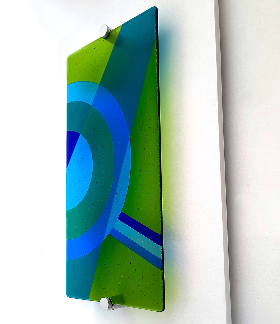 Thumbnail: Geometric abstract blue and green fused glass mounted wall art