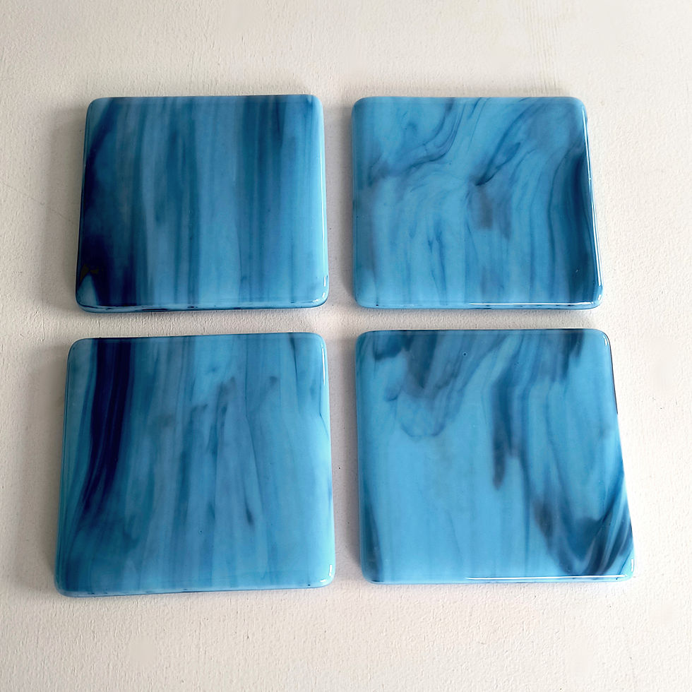 Thumbnail: Set of four unique blue fused glass coasters