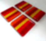 Red and yellow striped handmade fused glass coasters