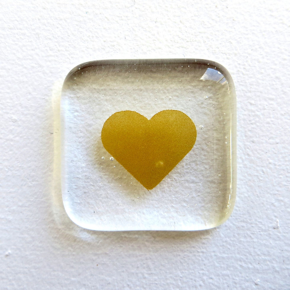 Thumbnail: Handmade gold fused glass pocket heart token