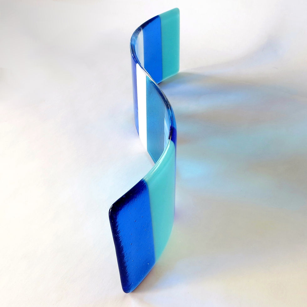 Thumbnail: Handmade blue and white fused glass curve