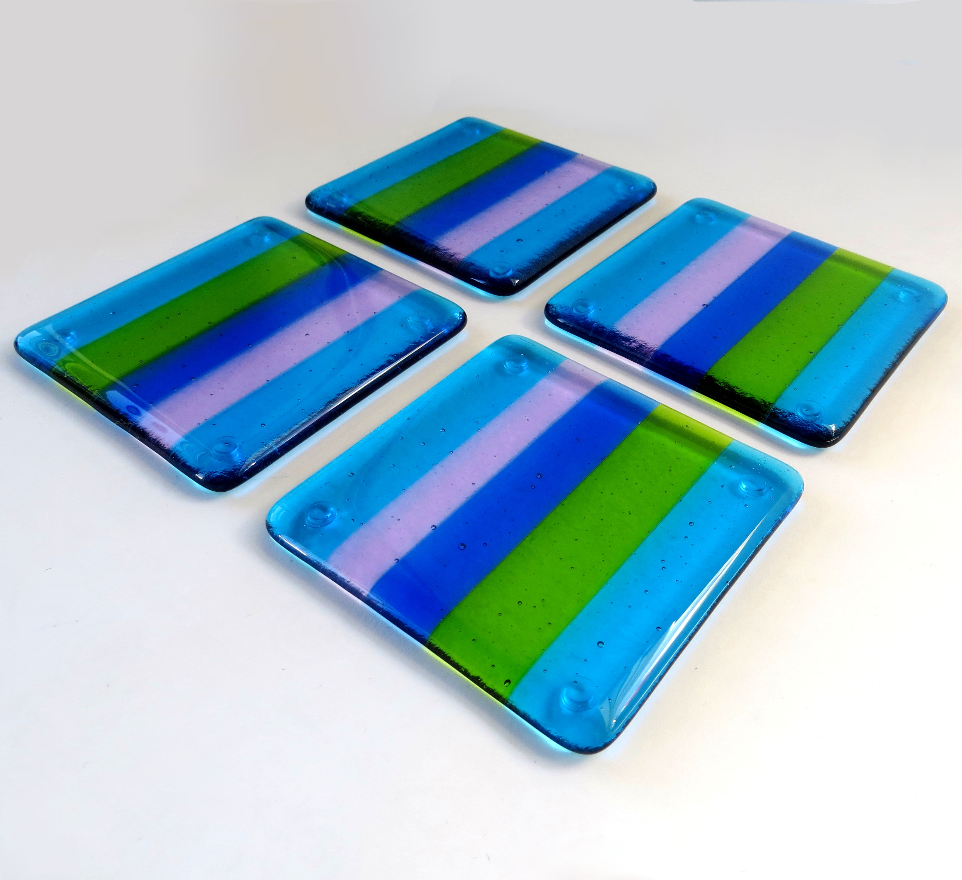 Blue, green and purple striped fused glass coasters