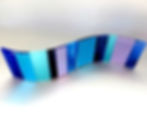 Blue and purple fused glass wave curve