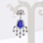 Sapphire chandelier earrings with layered blue sapphires in white gold and diamond detailing