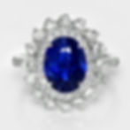 Oval blue sapphire ring with diamond cluster halo