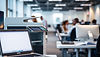 office setting with a copier and laptop in a busy office.jpg