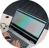 A student programming their brainwave using a laptop.