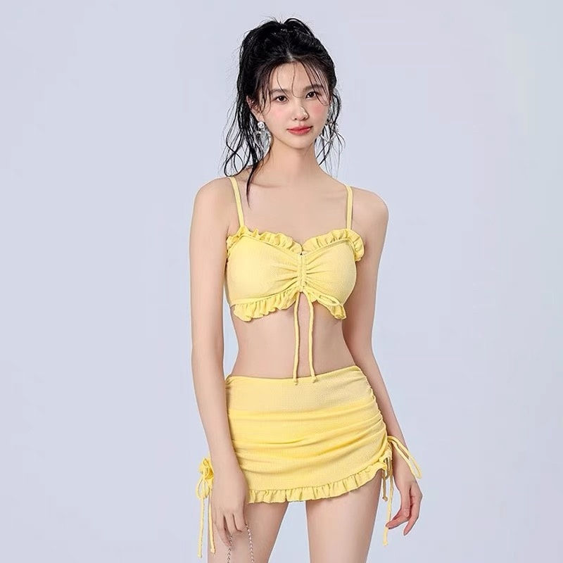 Thumbnail: Sun-Kissed Style: Bikini with Matching Wrap Skirt