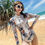 Thumbnail: Tropical Escape: Long-Sleeve One-Piece Swimsuit with Colorful Print