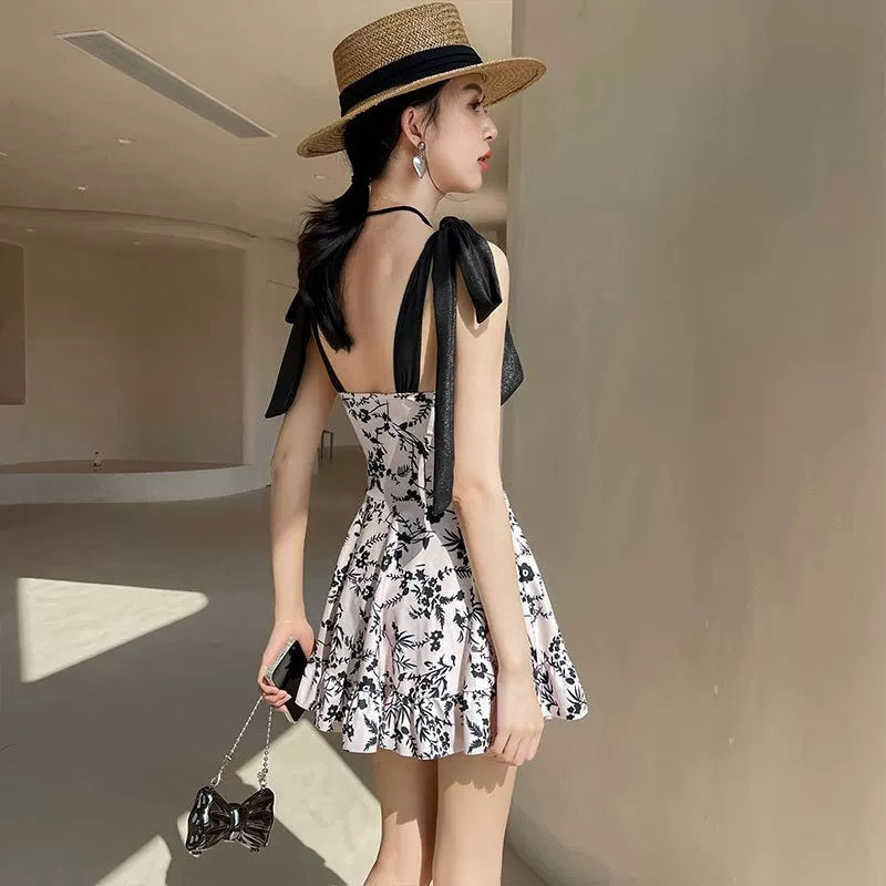 Thumbnail: Black and White Floral Skirted One-Piece Swimsuit