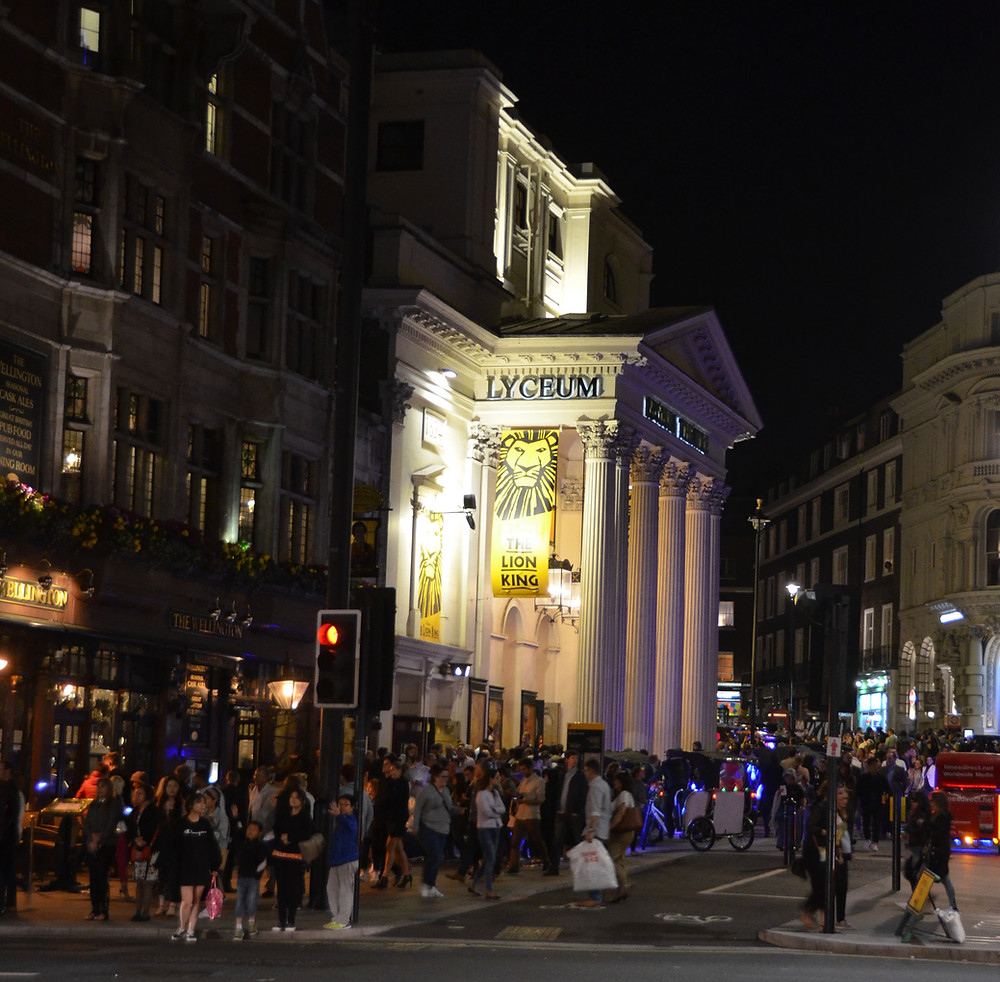Theatre goers empty on the streets