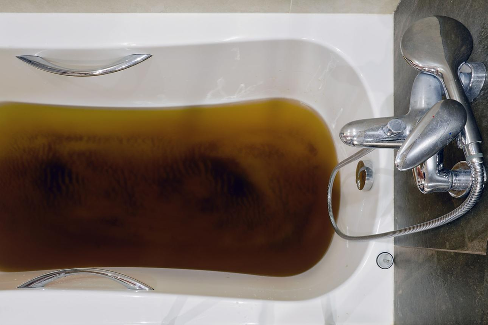 Sewage backing up into a bathtub due to a damaged or blocked sewer line