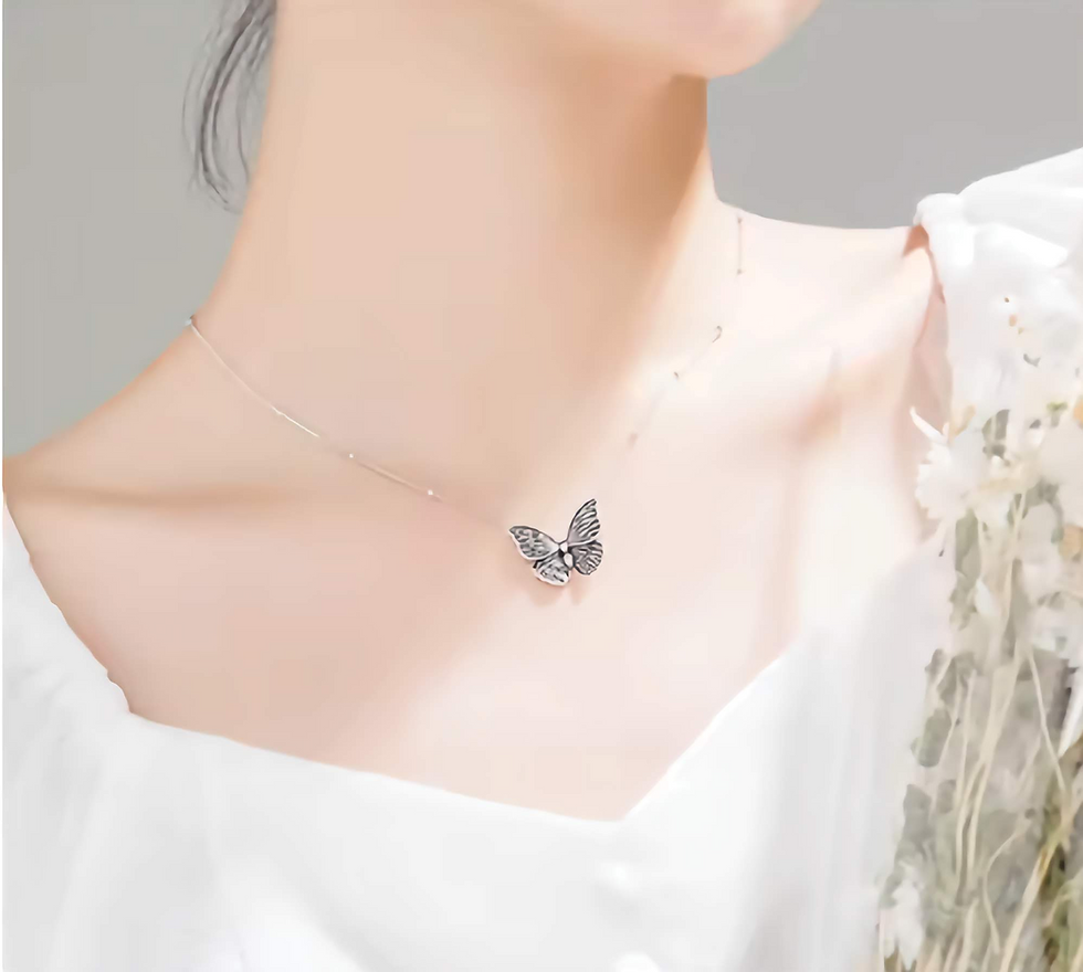 Thumbnail: sterling silver butterfly necklace on model