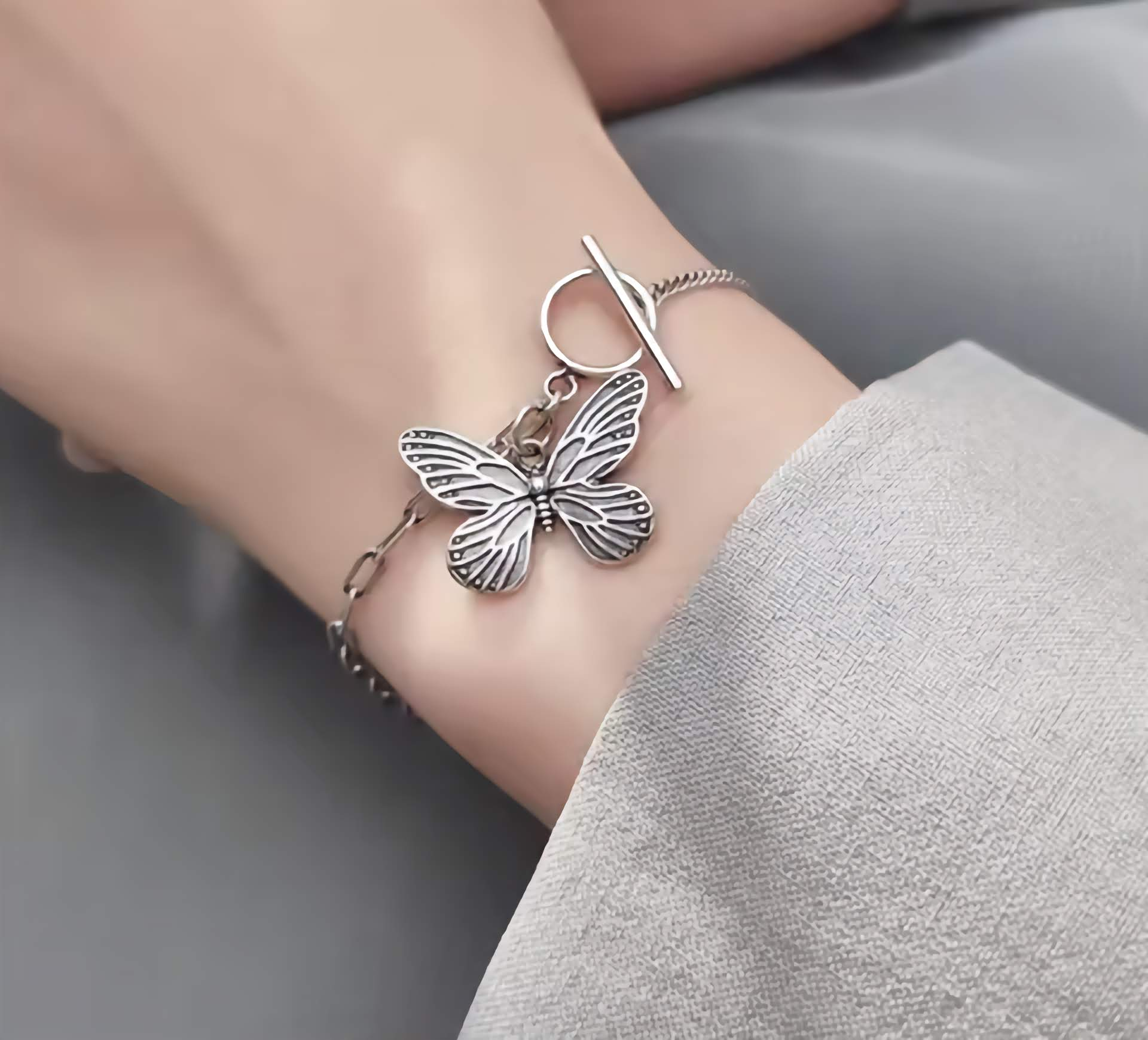 sterling silver butterfly bracelet on model