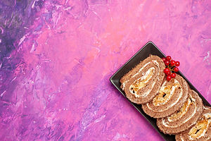 top-view-yummy-biscuit-rolls-with-fruits-pink-desk.jpg