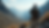 Wide angle view of rocky mountain terrain with tactical gear