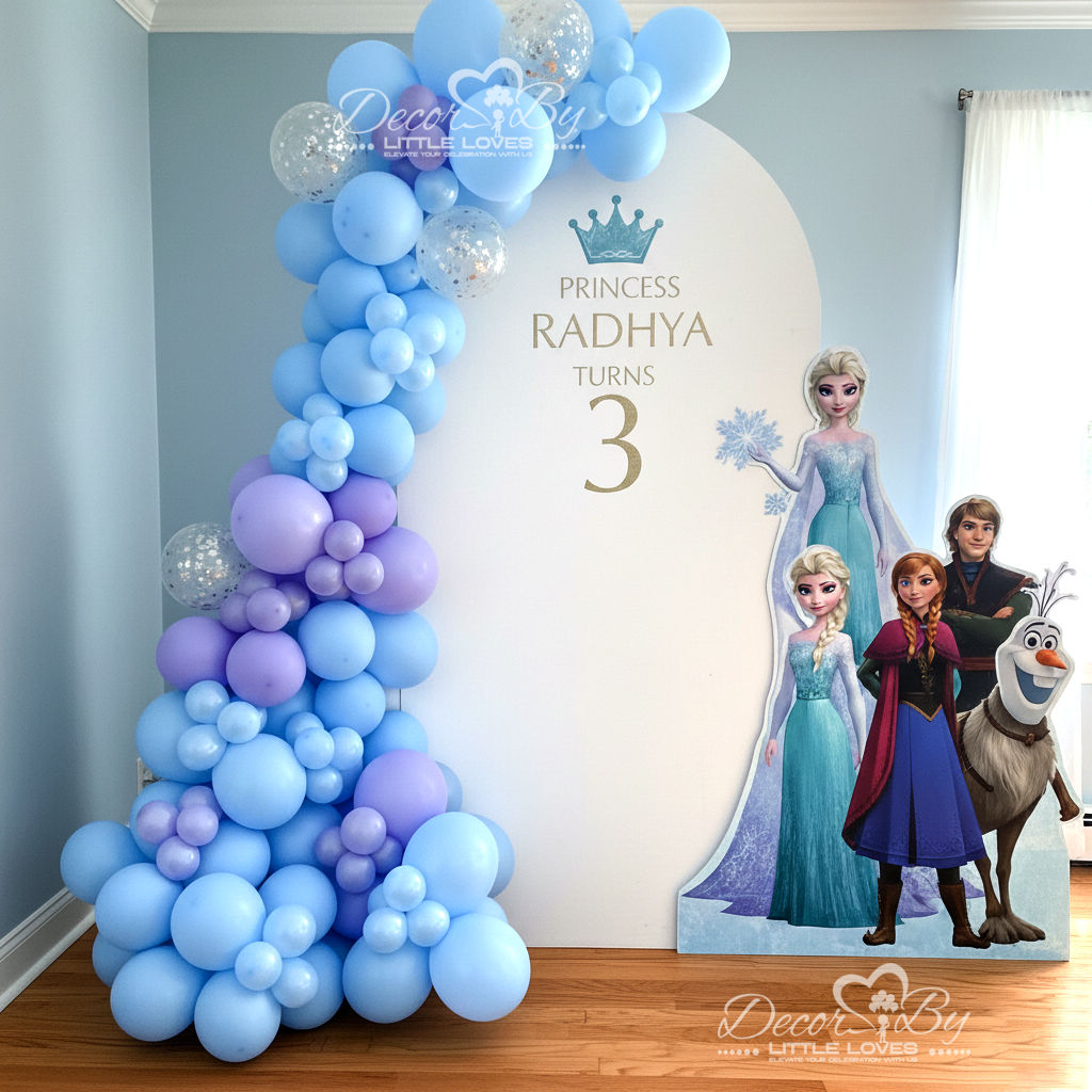 Princess Radhya three birthday party with Frozen characters and balloons.