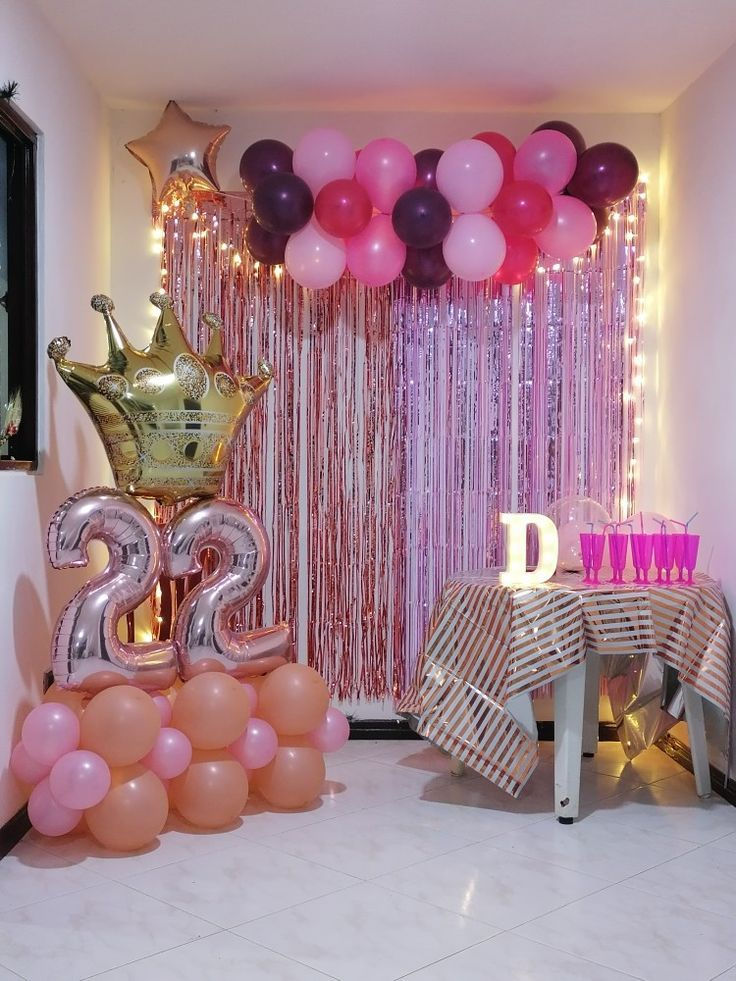 Birthday party decorations with pink balloons, 