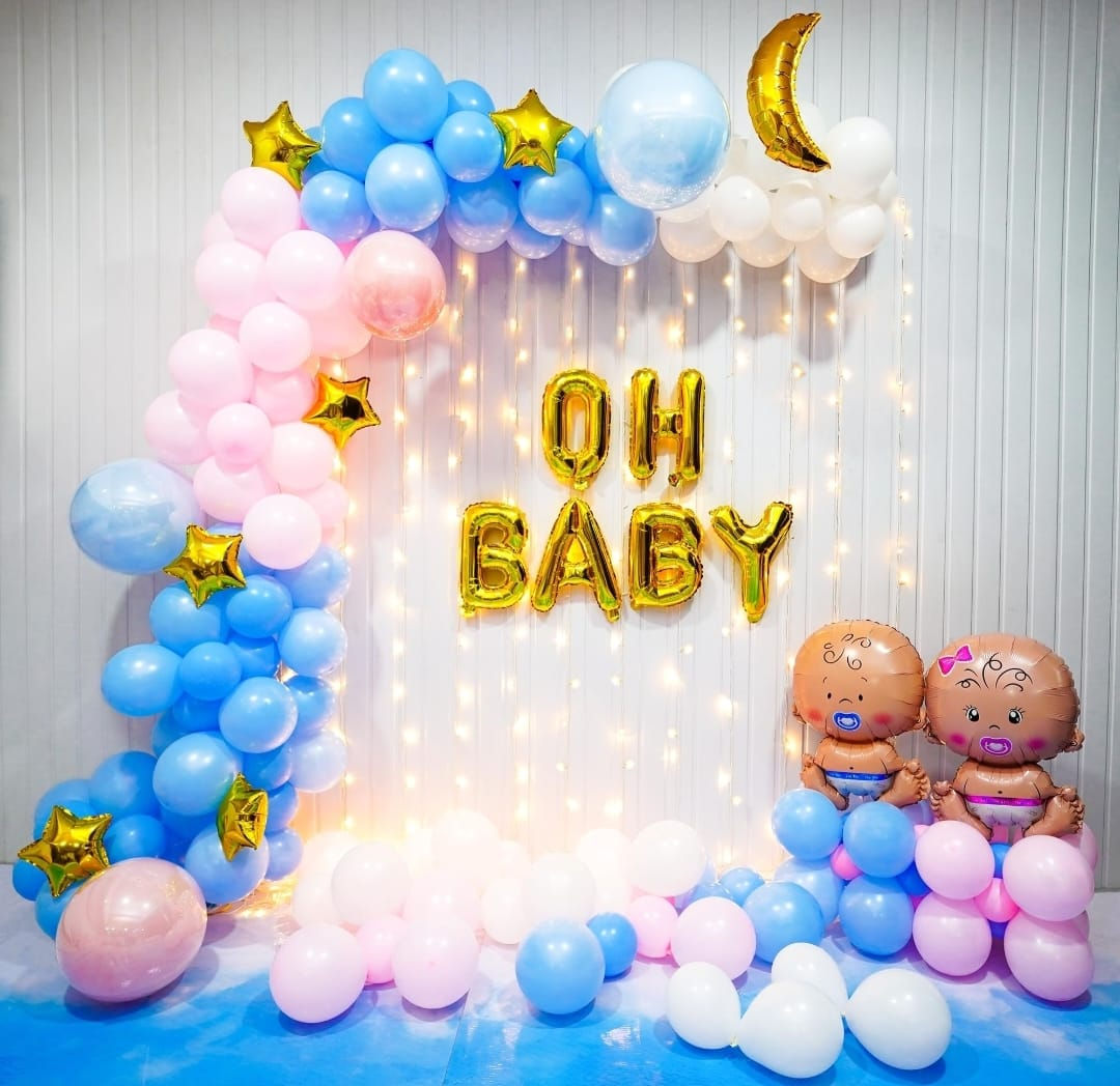 Baby shower decorations with balloons saying OH BABY Decor By Little Loves
