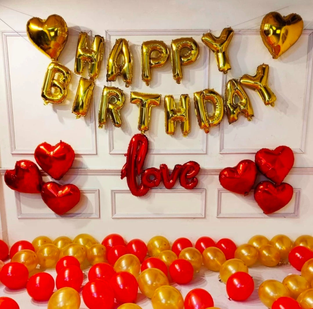 Golden balloons say Happy Birthday, red hearts and love decor by Little Loves.