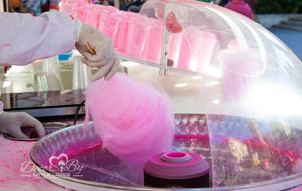 Making cotton candy, pink sweet treat, Decor By Little Loves, fun party time.