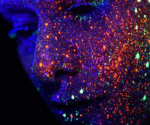neon face listening to vibration and frequency
